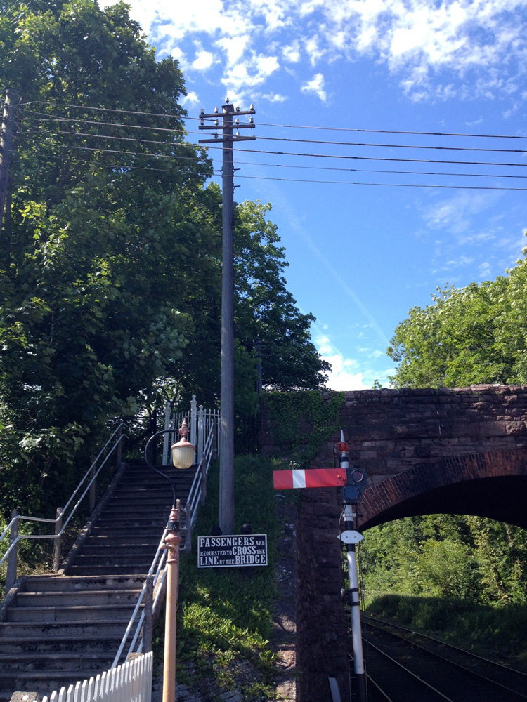 A very old pole trackside of the West Somerset Railway.