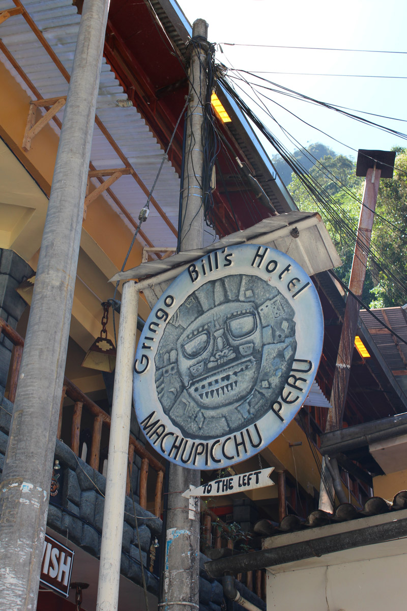 Is this P.O.T.M. material? Over to you dear Telegraphpoleologists Telegraph Pole with sign attached for Gringo Bill's Hotel, Machupicchu, Peru
