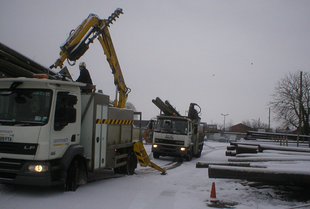 A brave BT Openreach crew embark upon another pole erection mission A BT Openreach crew embark upon another mission