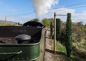 West Somerset Railway, poles on trackside as viewed from footplate of steam loco.