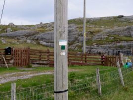 Close-up of the pole information on the only old pole on Berneray
