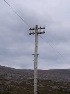 2 armed pole with insulators on A859 through Harris en route to Lewis