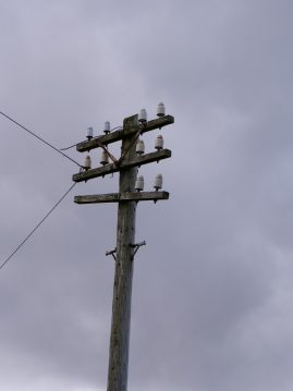 Wonky 3-armed telegraph pole, roadside at Bragar, Isle of Lewis